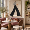 Modern and stylish canvas wall art featuring black and white stripes, suitable for decorating living rooms, hotels, offices, and boutiques